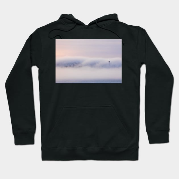 Dreamy thick fog at sunrise over hill Hoodie by Juhku